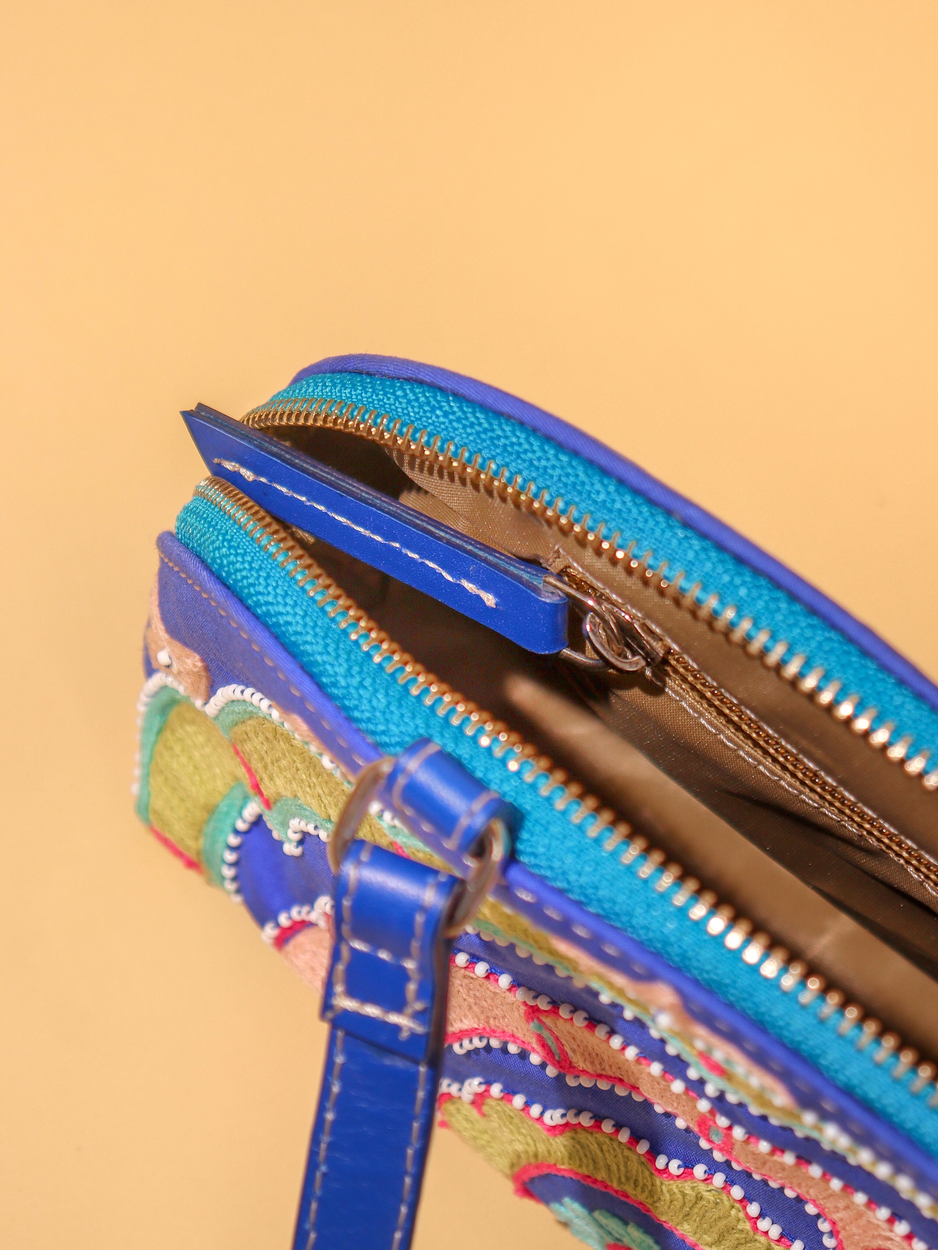 Colorful Embroidered Dome Clutch