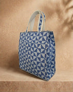 hand block printed back panel of a blue bag