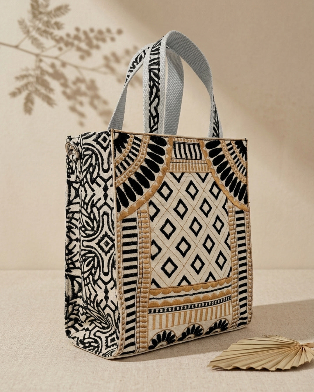 Tote bag with geometric pattern on a neutral background